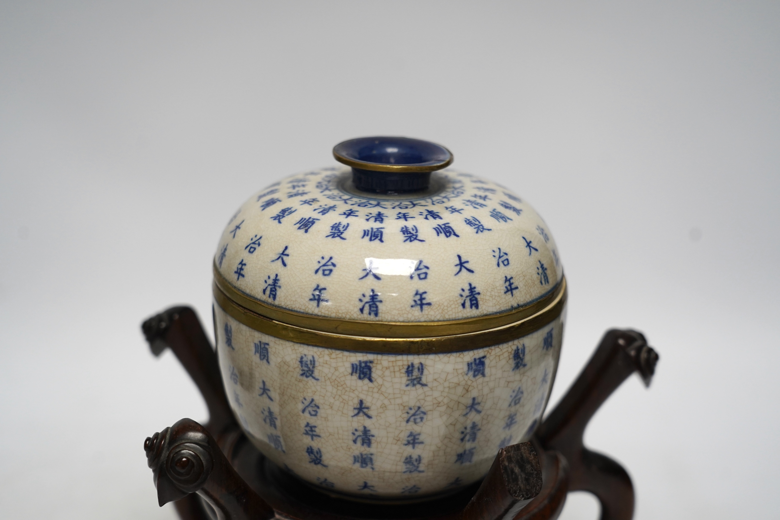 Oriental items to include a cylindrical blue and white vase with associated hardwood stand, a Japanese watercolour painting on silk together with a Japanese bamboo page turner